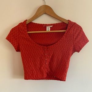 H&M orange crop top size S with button placket.